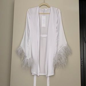 white silk bridal robe with feather sleeve trim